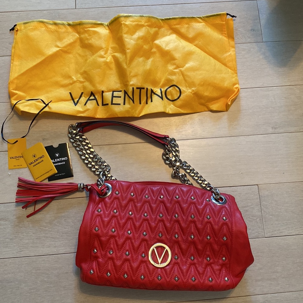 Valentino authentic like new red leather bag. Gorgeous. Sliver studs